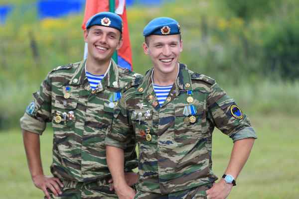Russian VDV paratroopers wearing blue berets and blue striped telnyashka shirts during a military event