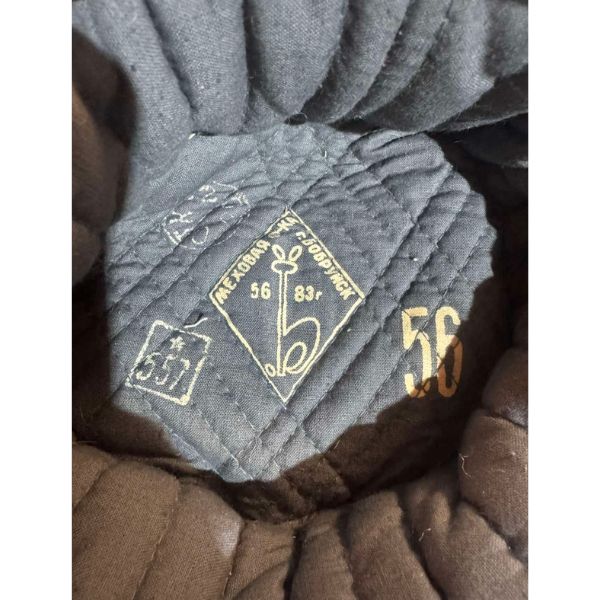 Original Soviet Ushanka interior showing authentic USSR factory stamp and markings