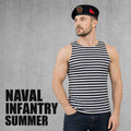 Man wearing a black and white striped Naval Infantry summer telnyashka tank top with a Soviet naval infantry beret against a gray concrete background.