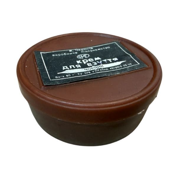 Closed container of original Soviet black boot cream from the Afghan War and Cold War period.