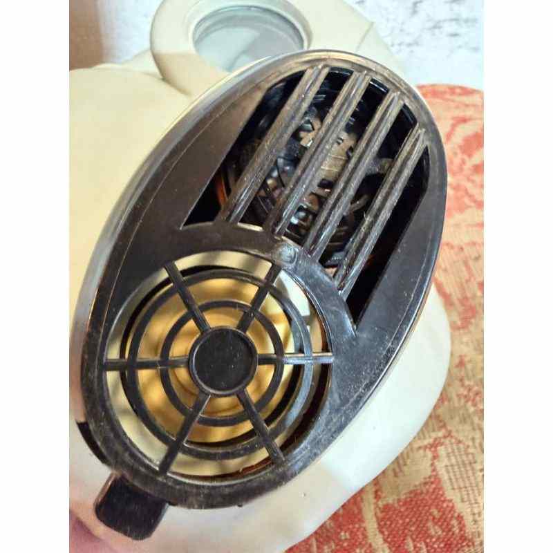 Vintage Soviet Hamster gas mask showing central breathing valve assembly