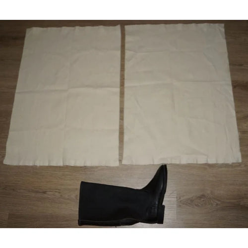 Original Soviet Portyanki foot wraps displayed with traditional Soviet Kirza military boots