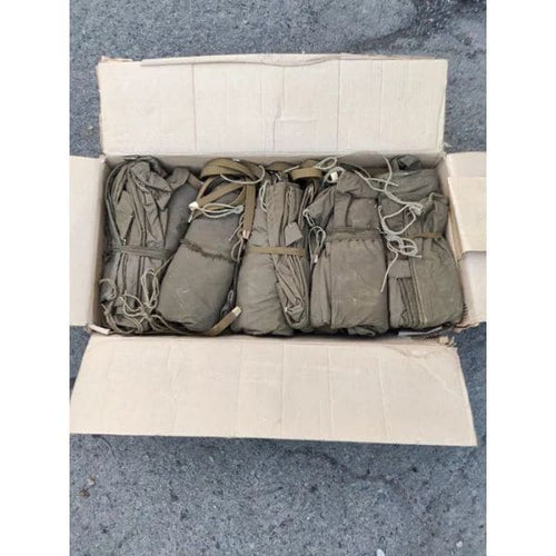 Original Soviet Veshmeshok backpacks in authentic military surplus warehouse stock.