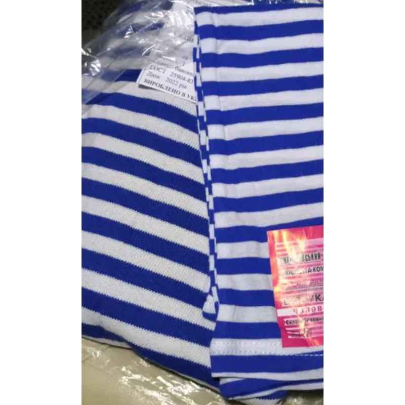 Close-up of VDV Summer Telnyashka sleeveless blue and white striped cotton fabric.