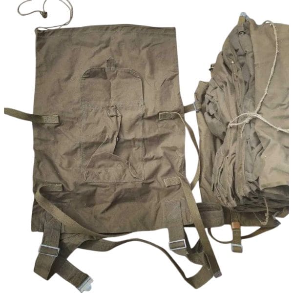 Vintage Soviet Veshmeshok military canvas backpack with authentic field equipment.